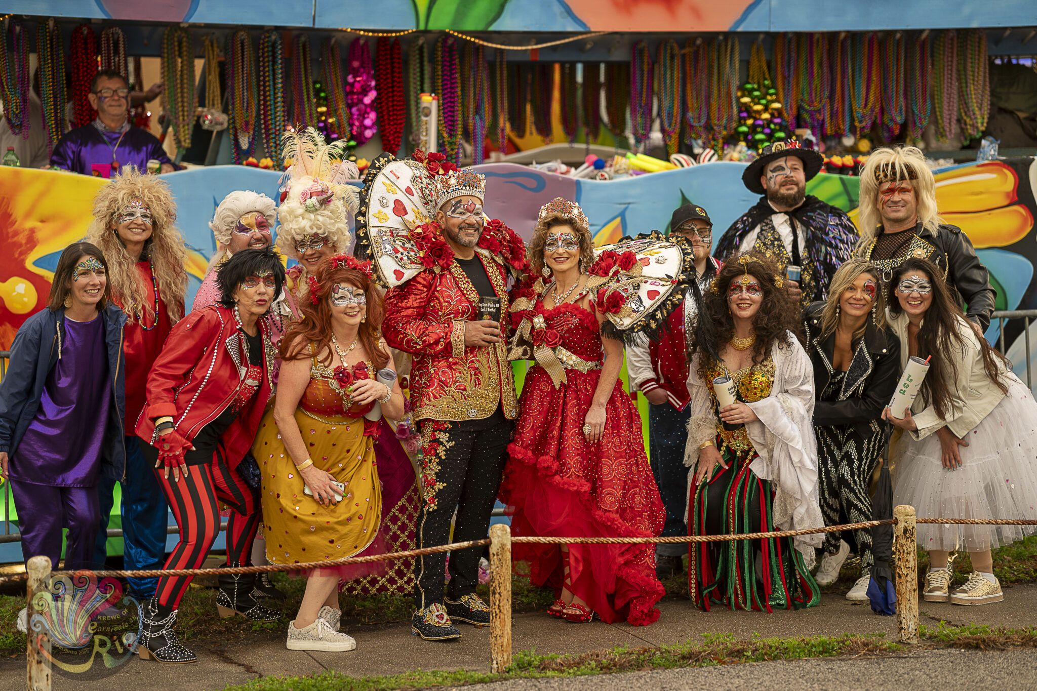 2024 Royalty in front of float at Parada